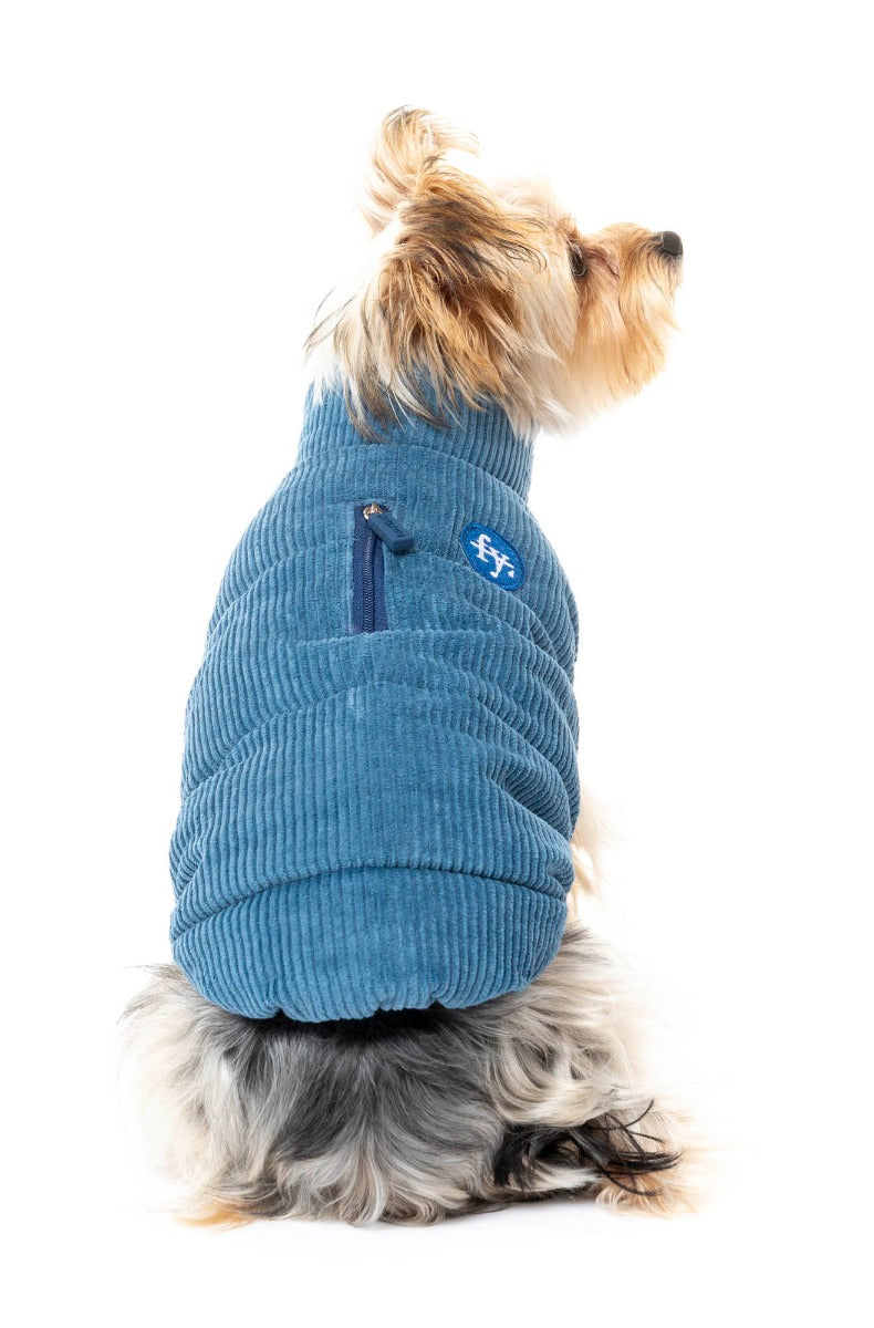 small dog wearing the Mosman puffer Jacket In washed blue